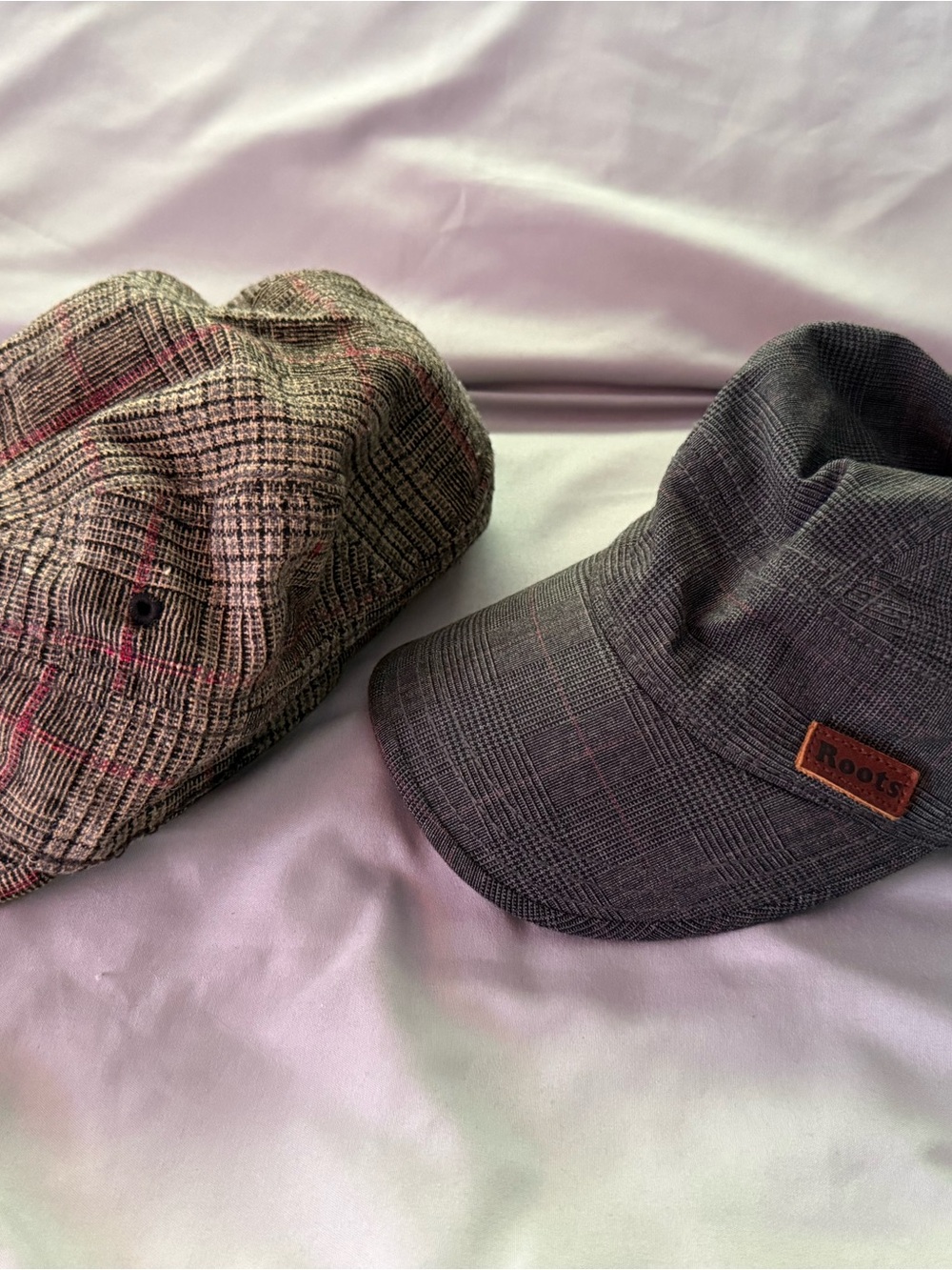 Roots Gray Plaid Womens Cap and Roots Brown Plaid Cap.One has inside rim cut out